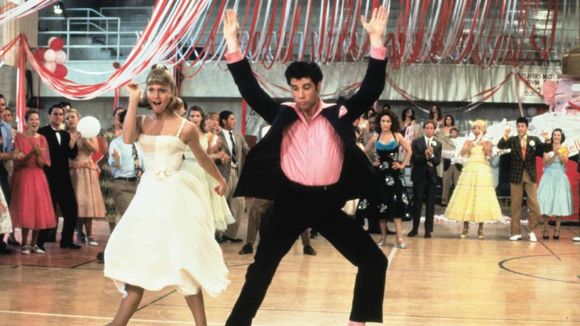 A teenage girl and teenage boy dancing in a high school gym in this image from Paramount Pictures.