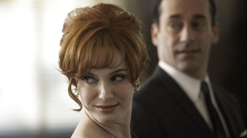 A close-up shot of a woman with red hair and a man with dark hair in this image from Lionsgate Television.