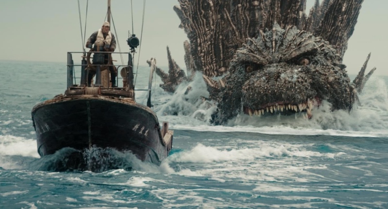 A giant monster chases after a boat in this image from Toho Studios.