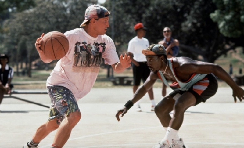 Two players face off in a basketball game at a park in this image from 20th Century Fox.