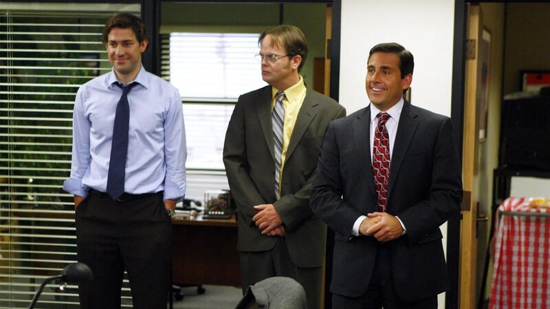 Three men standing in an office in this image from Deedle-Dee Productions.