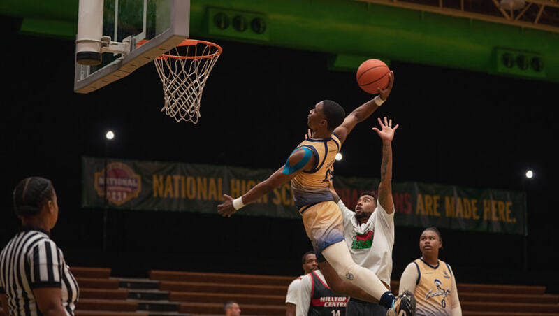 A basketball player jumps to dunk the ball in this image from Undisputed Cinema.