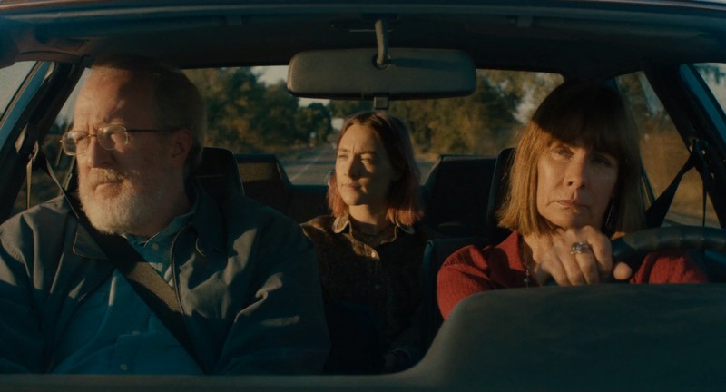 Unhappy parents driving their teen daughter in this photo from IAC Films.