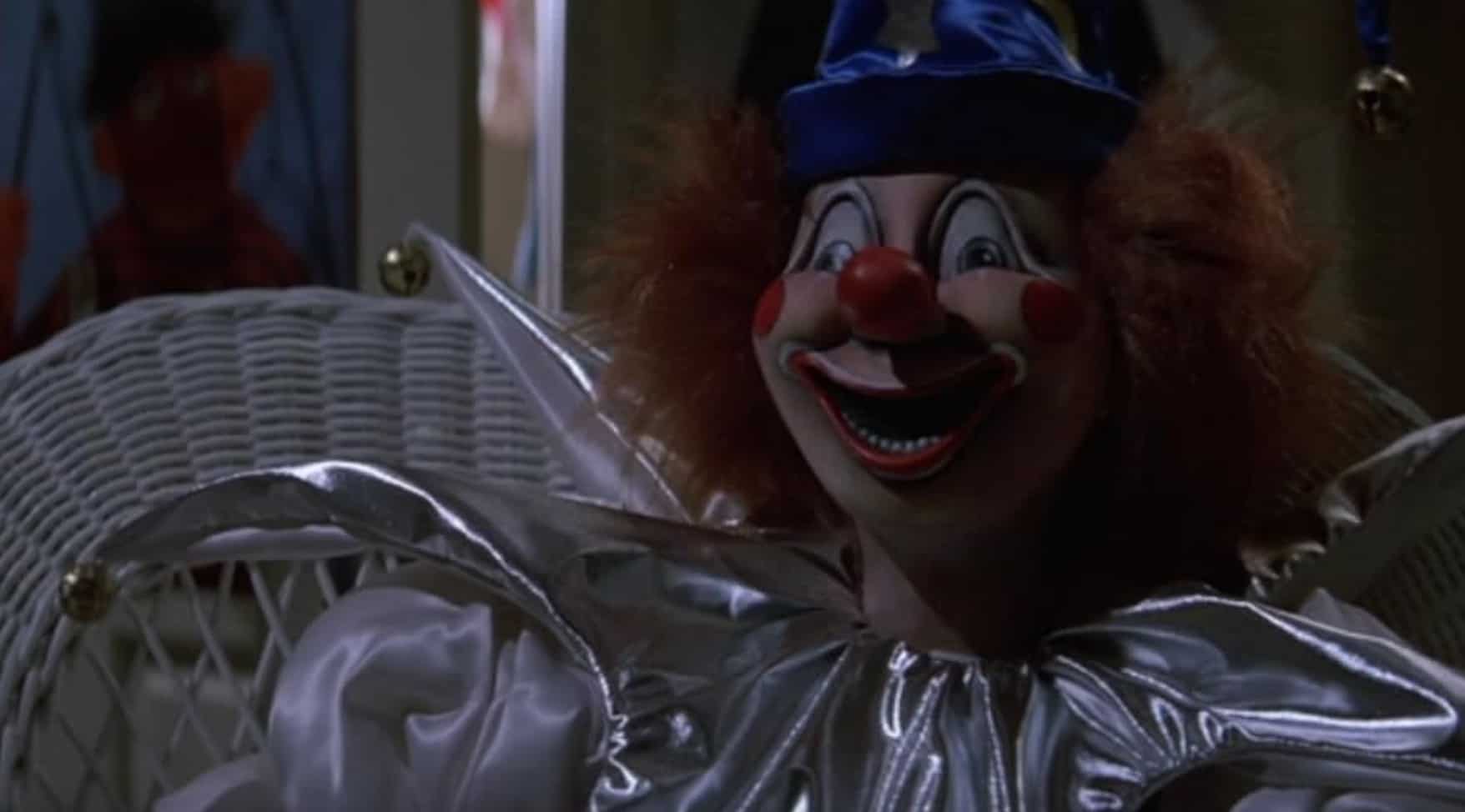 A clown doll sits in a chair in this image from metro-Goldwyn-Mayer.
