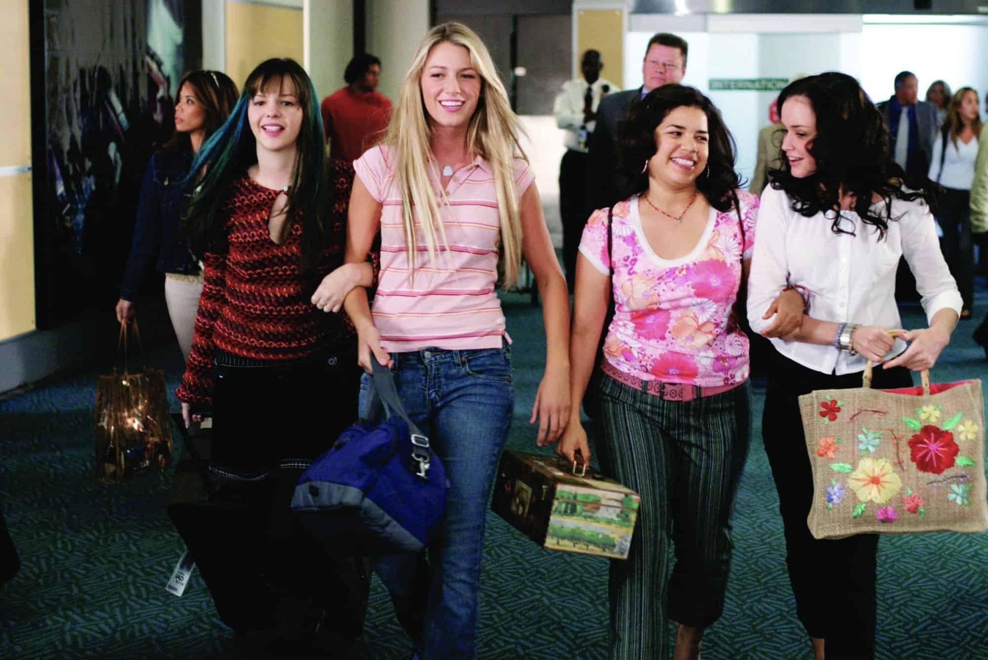  Four girls link arms in an airport in this image from Alcon Entertainment.
