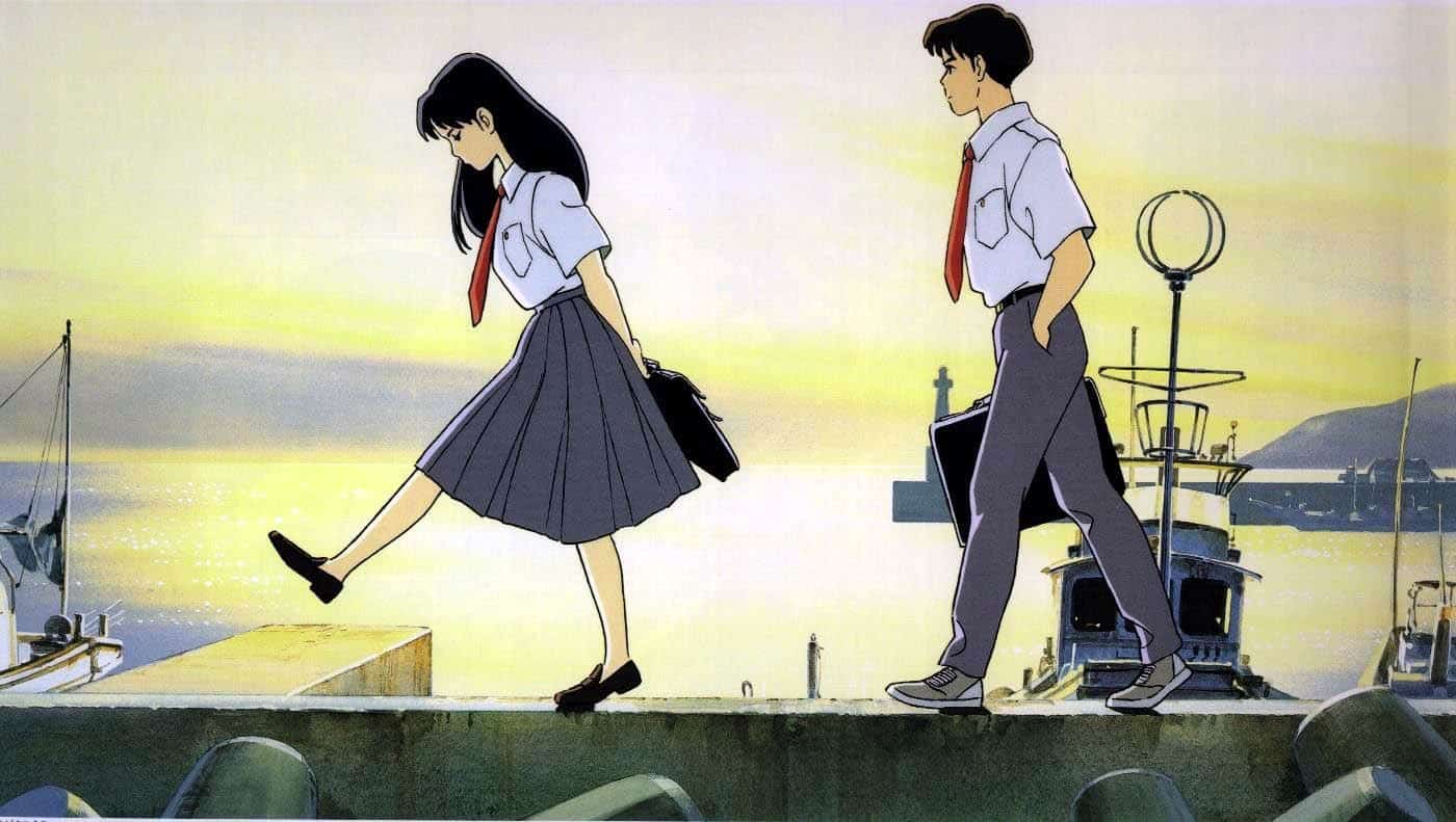 An animated schoolgirl and boy walk along a harbor in this image from Studio Ghibli.