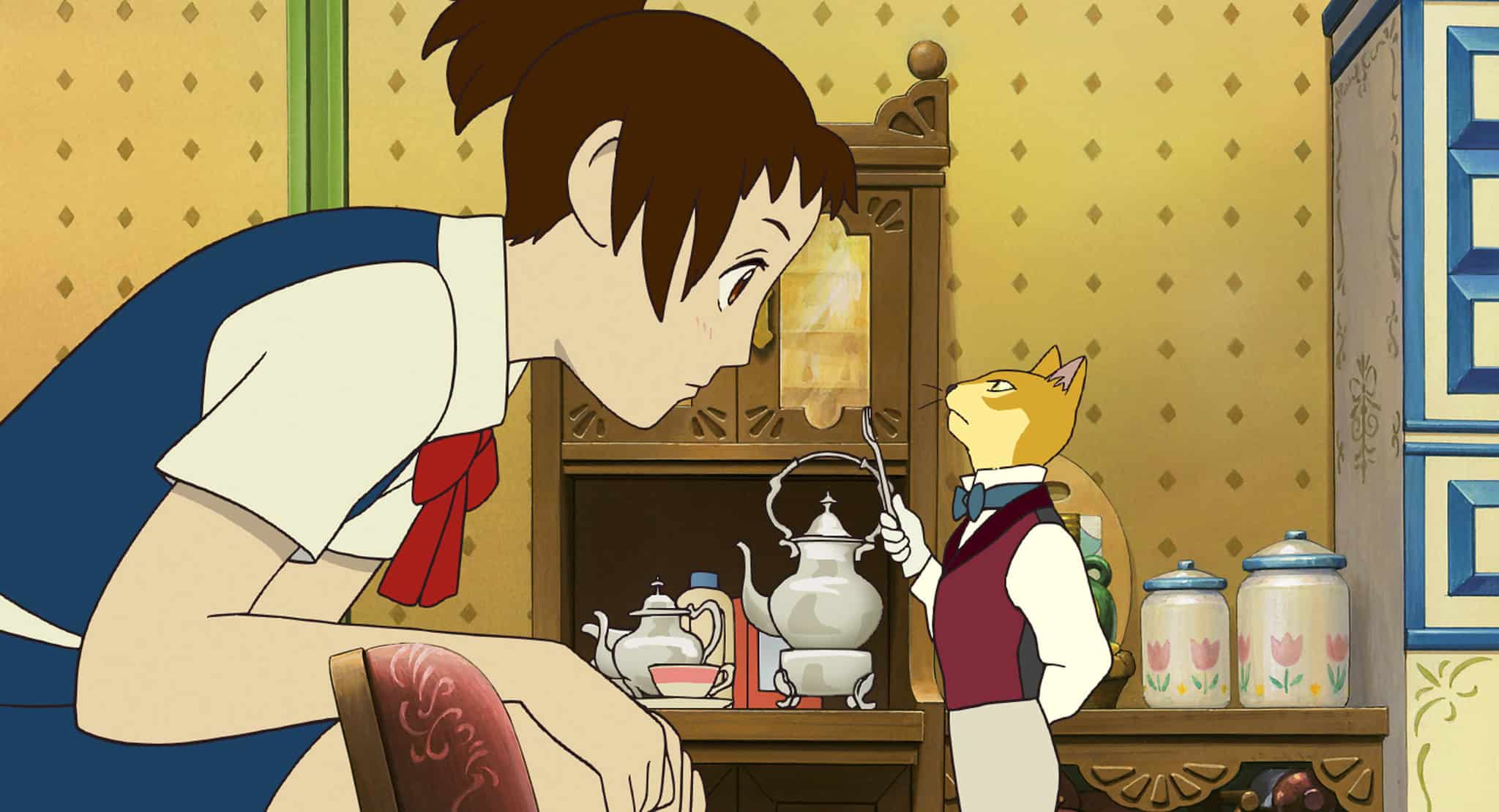 An animated schoolgirl talking to a cat in this image from Studio Ghibli.